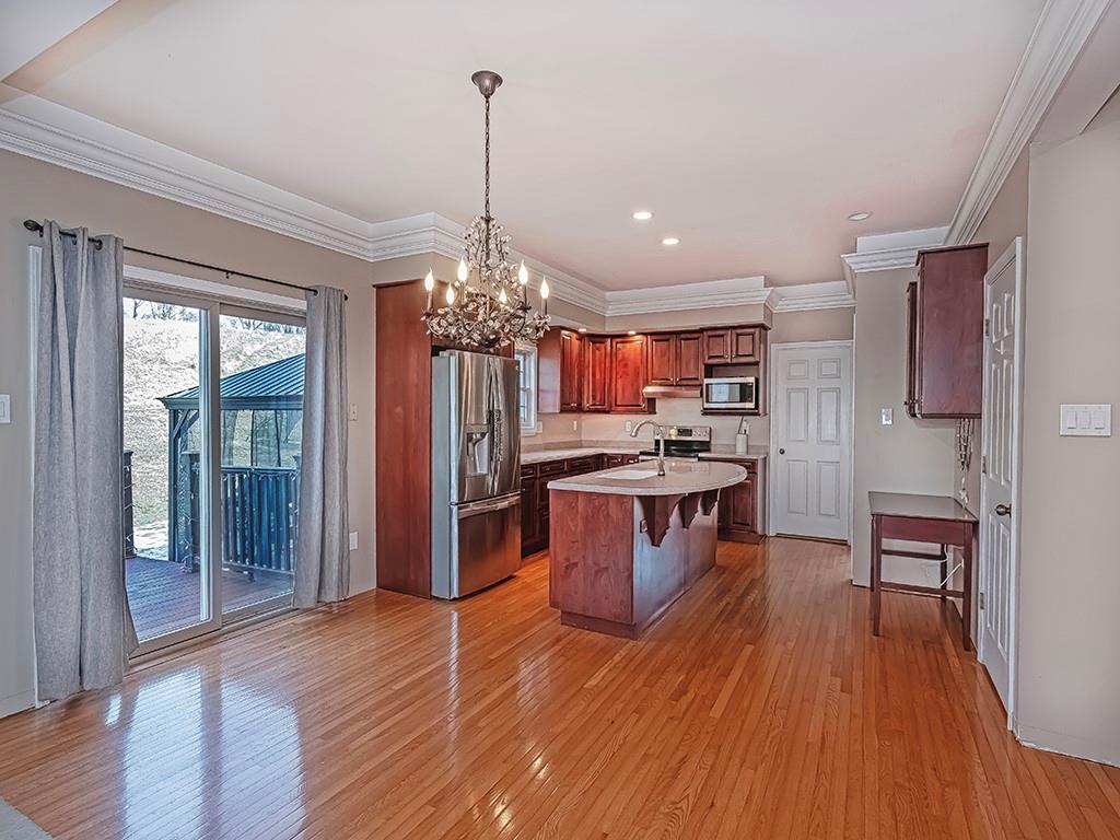 223 Arrowhead Lane Eighty Four, PA 15330 - Photo 12 of 42 a view of a kitchen with granite countertop stainless steel appliances and wooden floor