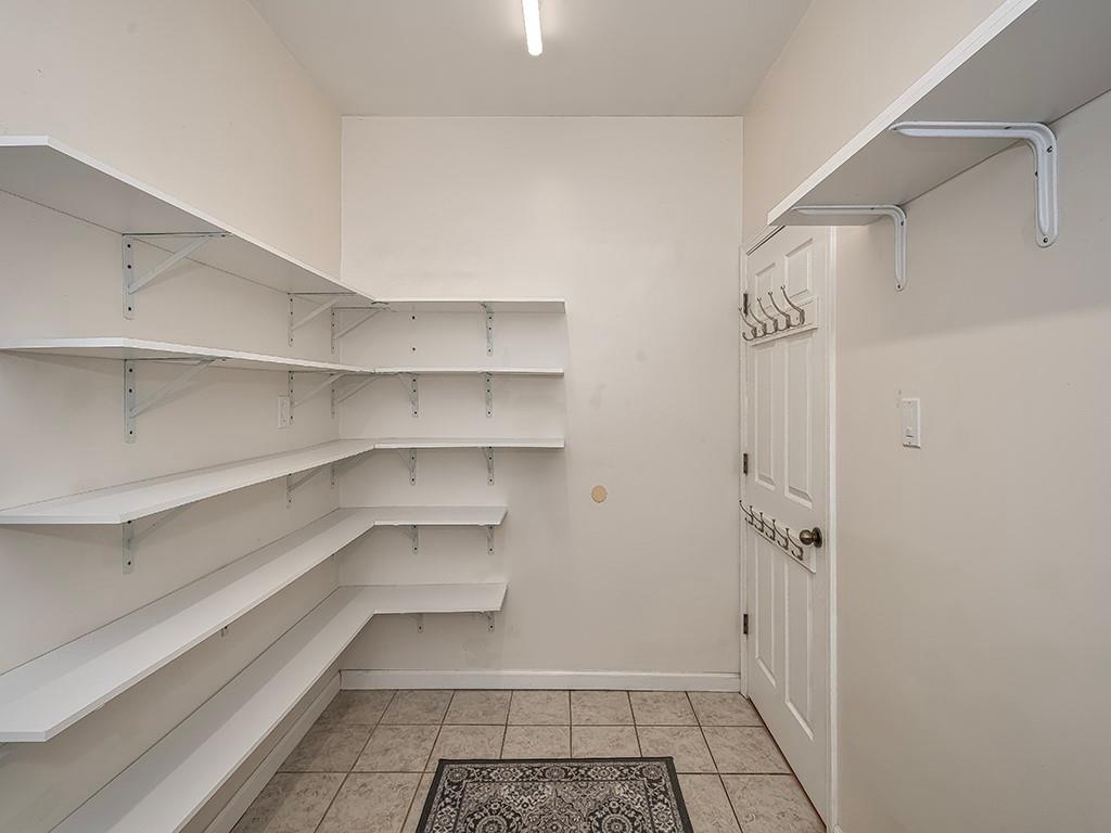 223 Arrowhead Lane Eighty Four, PA 15330 - Photo 17 of 42 a view of walk in closet with empty racks