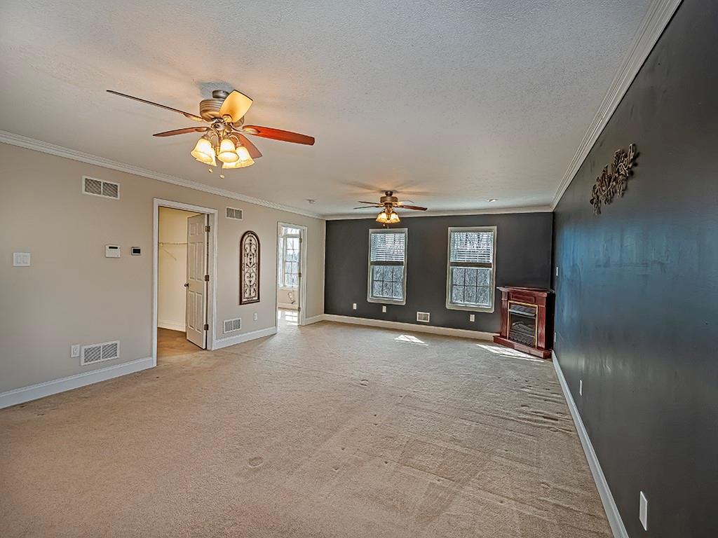 223 Arrowhead Lane Eighty Four, PA 15330 - Photo 24 of 42 a view of a livingroom with a flat screen tv and chandelier