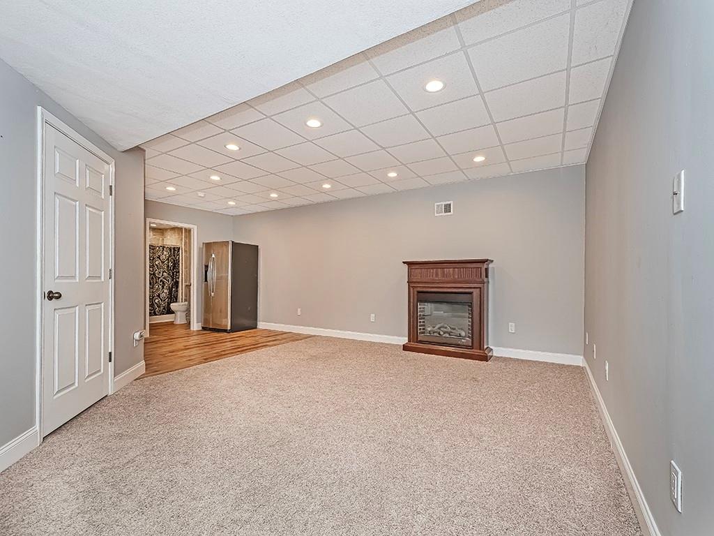 223 Arrowhead Lane Eighty Four, PA 15330 - Photo 38 of 42 a view of an empty room with a fireplace