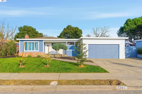 an aerial view of a house with outdoor space