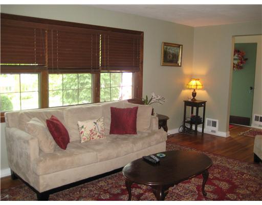1550 Powers Run Road Pittsburgh, PA 15238 - Photo 2 of 14 Living Room. Hardwood floors, fireplace and large windows overlooking the front of the property.