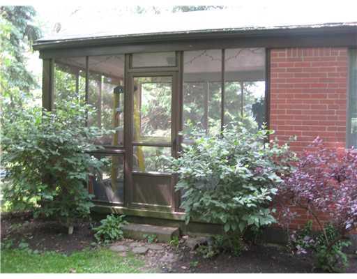 1550 Powers Run Road Pittsburgh, PA 15238 - Photo 13 of 14 Other. View of screen porch from outside.