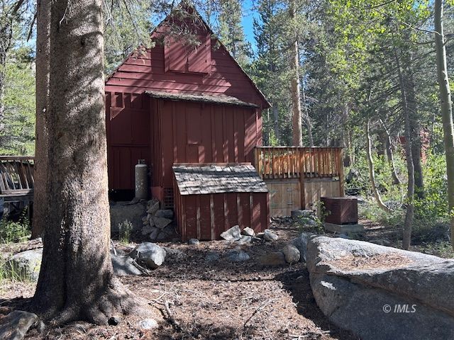 2 South Lake Road Bishop, CA 93514 - Photo 2 of 18 a view of a patio with a table and chairs under an umbrella