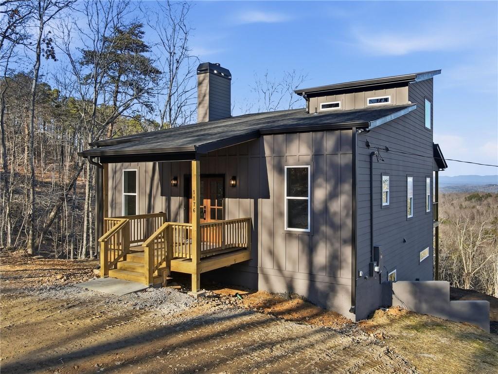 1176 Jewel Court Northeast Ranger, GA 30734 - Photo 52 of 58 a view of a house with small yard