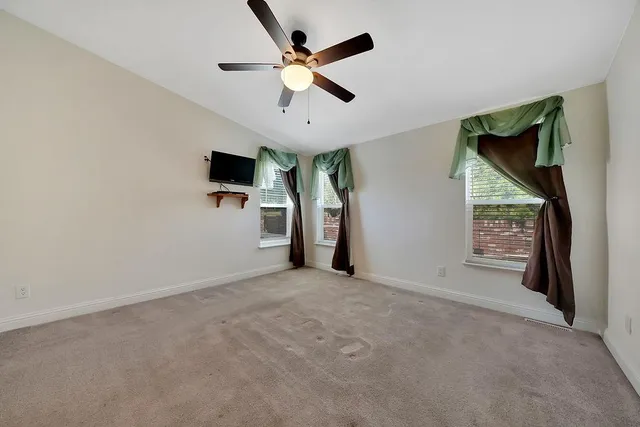 front view of a house with a small yard