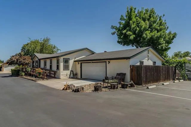a view of a house with a garden