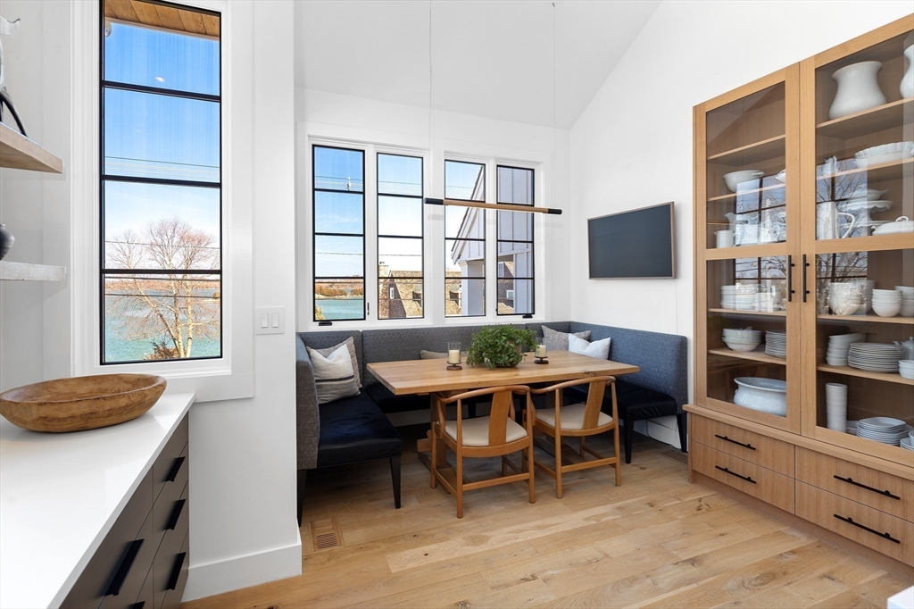 178 Otis Street Hingham, MA 02043 - Photo 12 of 41 a view of a workspace with furniture and a window