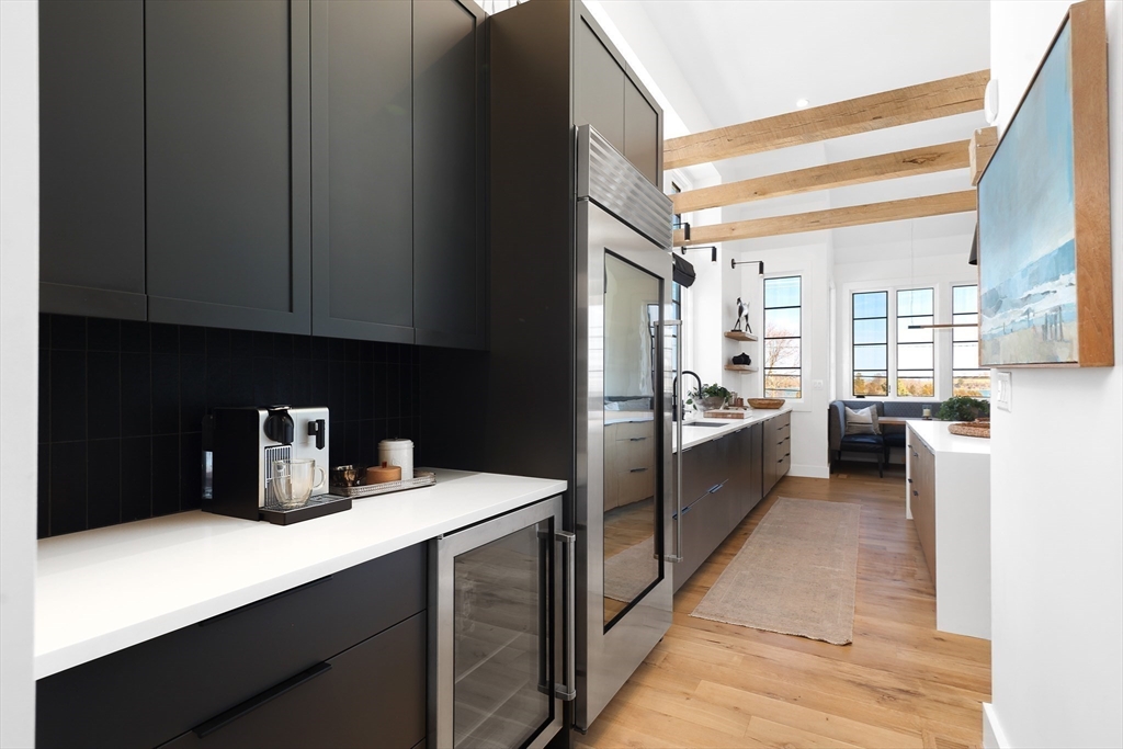 178 Otis Street Hingham, MA 02043 - Photo 13 of 41 a kitchen with counter top space cabinets and appliances