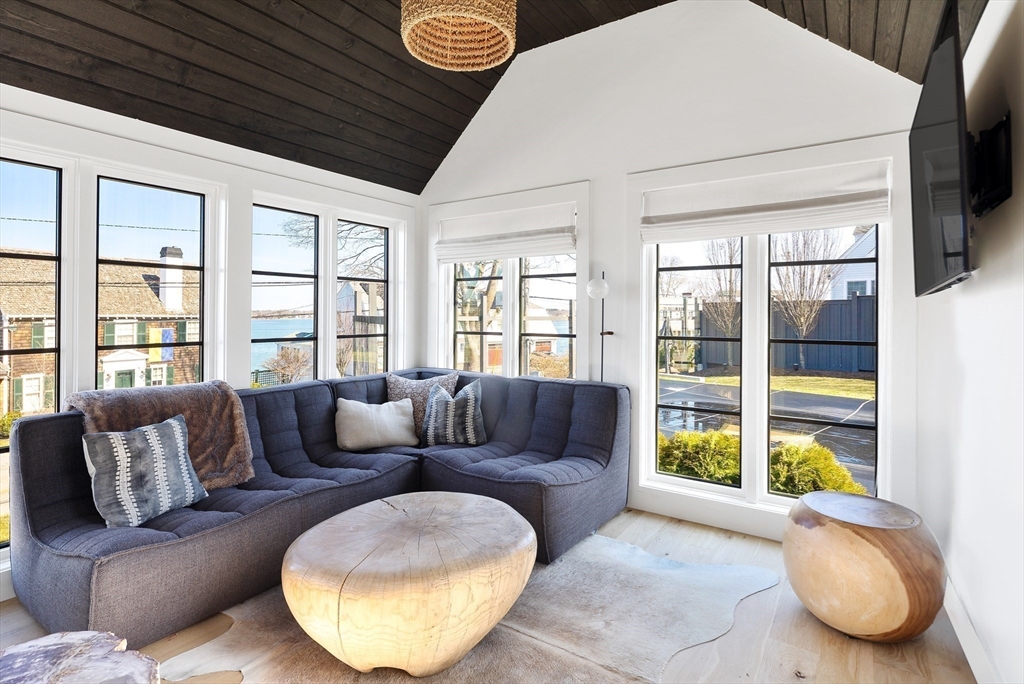 178 Otis Street Hingham, MA 02043 - Photo 16 of 41 a living room with furniture and a large window