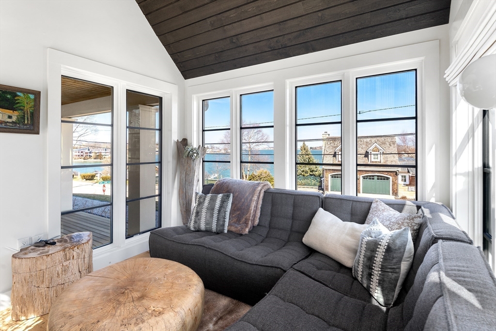 178 Otis Street Hingham, MA 02043 - Photo 17 of 41 a living room with furniture and large windows