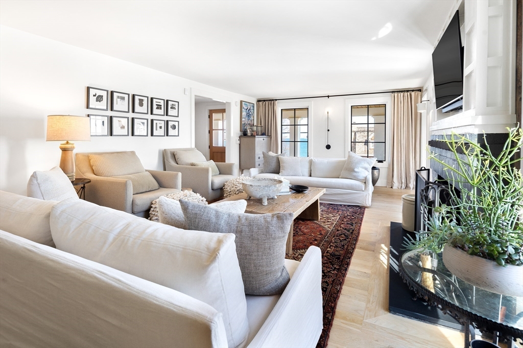 178 Otis Street Hingham, MA 02043 - Photo 19 of 41 a living room with furniture and a window
