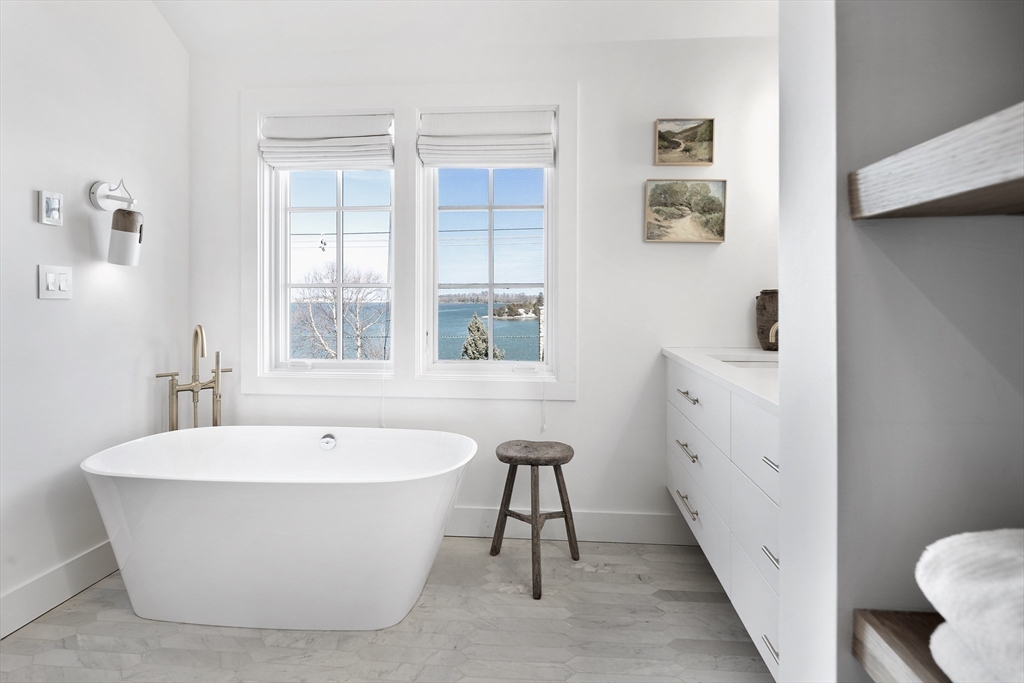 178 Otis Street Hingham, MA 02043 - Photo 26 of 41 a white bath tub sitting next to a white sink