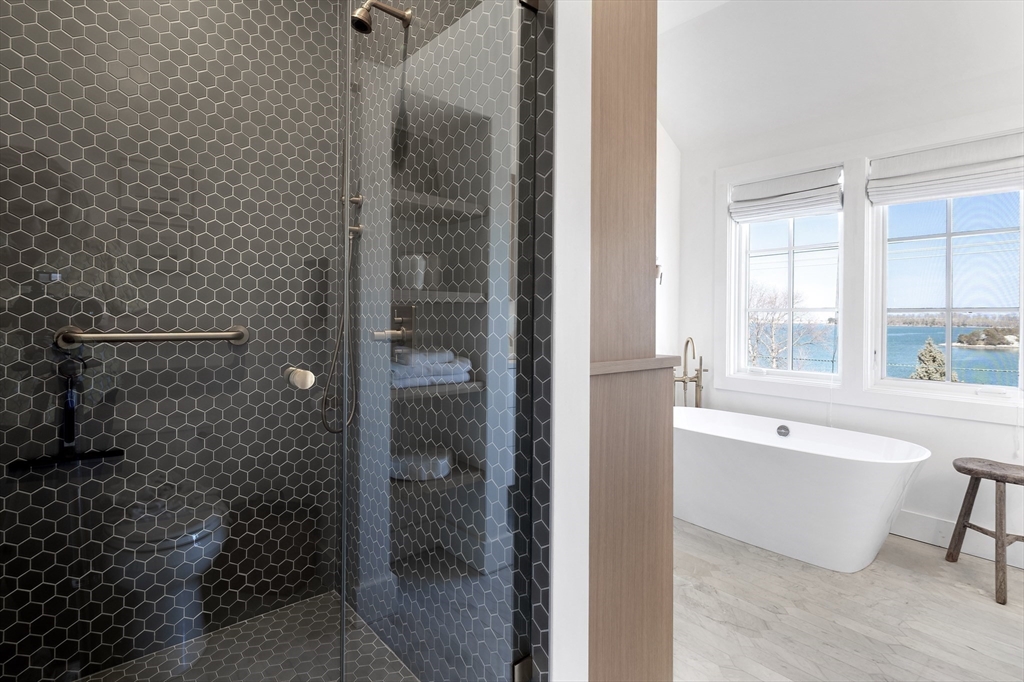 178 Otis Street Hingham, MA 02043 - Photo 27 of 41 a bathroom with a bathtub and a shower