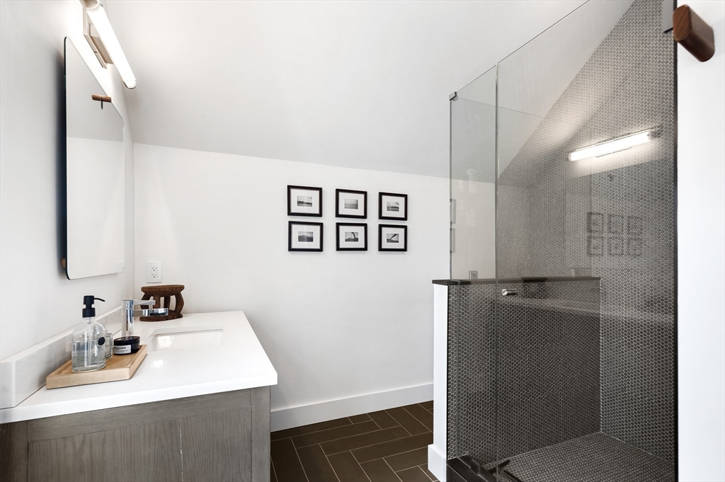 178 Otis Street Hingham, MA 02043 - Photo 29 of 41 a bathroom with a sink and a mirror