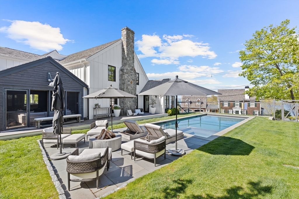 178 Otis Street Hingham, MA 02043 - Photo 36 of 41 a front view of house with yard and outdoor seating