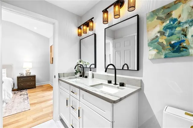 a bathroom with a sink and a mirror