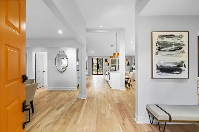 a view of a living room and wooden floor