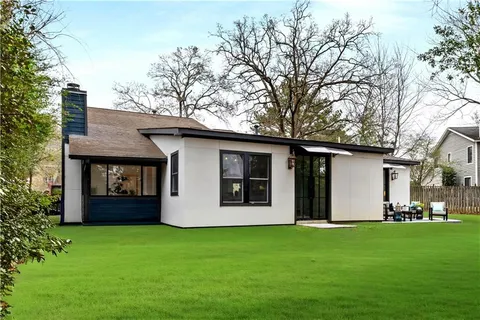 a house with garden in front of it