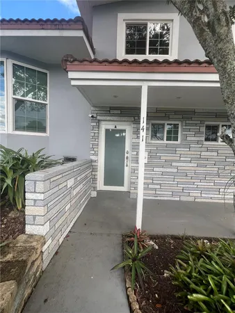 a view of house and front door
