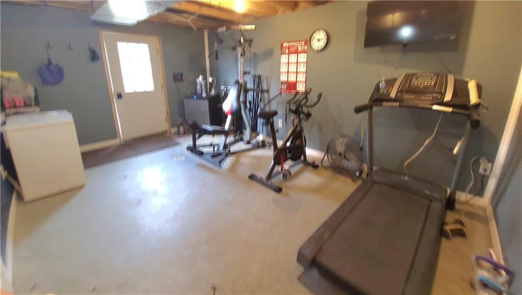 257 Hilltop Acres Road Slippery Rock, PA 16057 - Photo 17 of 25 a view of a room with gym equipment