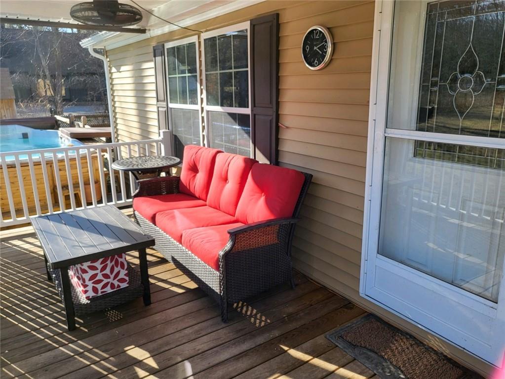 257 Hilltop Acres Road Slippery Rock, PA 16057 - Photo 2 of 25 a view of a wooden door with a bench