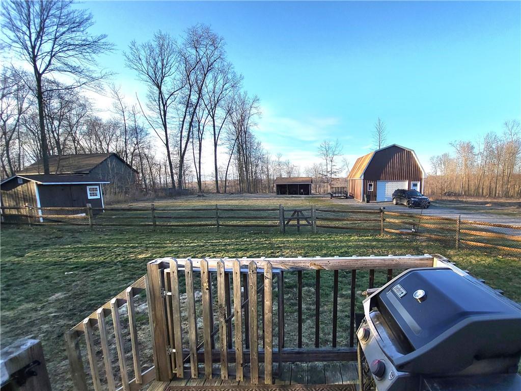 257 Hilltop Acres Road Slippery Rock, PA 16057 - Photo 21 of 25 a view of a two chairs in the deck
