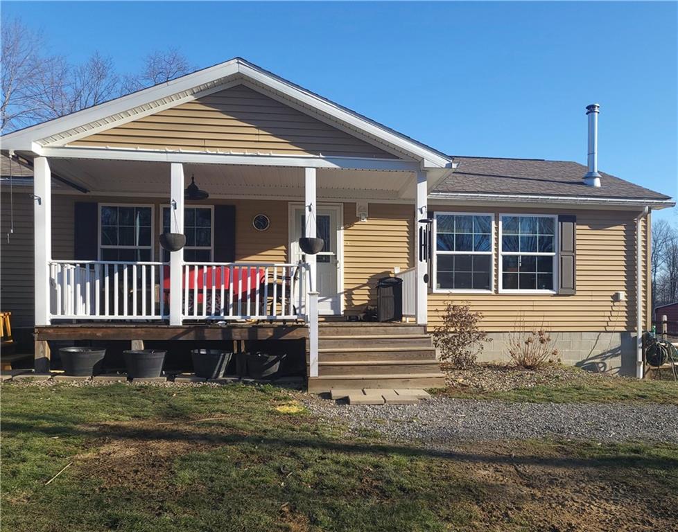 257 Hilltop Acres Road Slippery Rock, PA 16057 - Photo 25 of 25 front view of a house with a yard