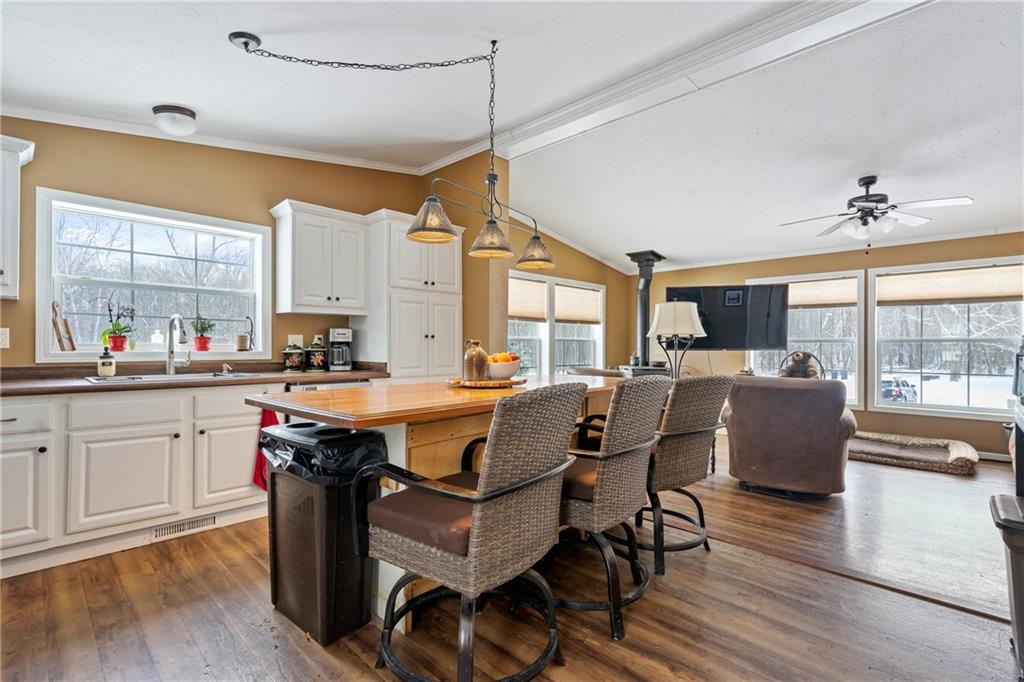 257 Hilltop Acres Road Slippery Rock, PA 16057 - Photo 5 of 25 a open kitchen with stainless steel appliances granite countertop a stove and a refrigerator