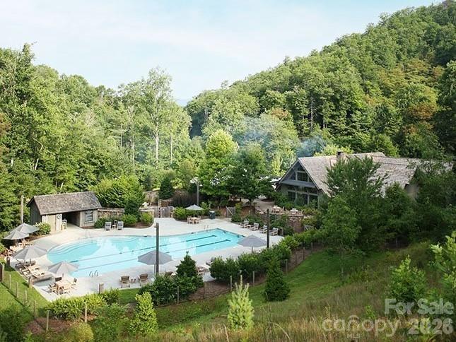 239 Down The Hl Road, Unit 239 Sylva, NC 28779 - Photo 12 of 18 a backyard of a house with lots of green space