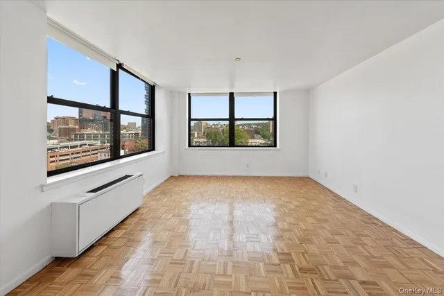 a view of an empty room with a window