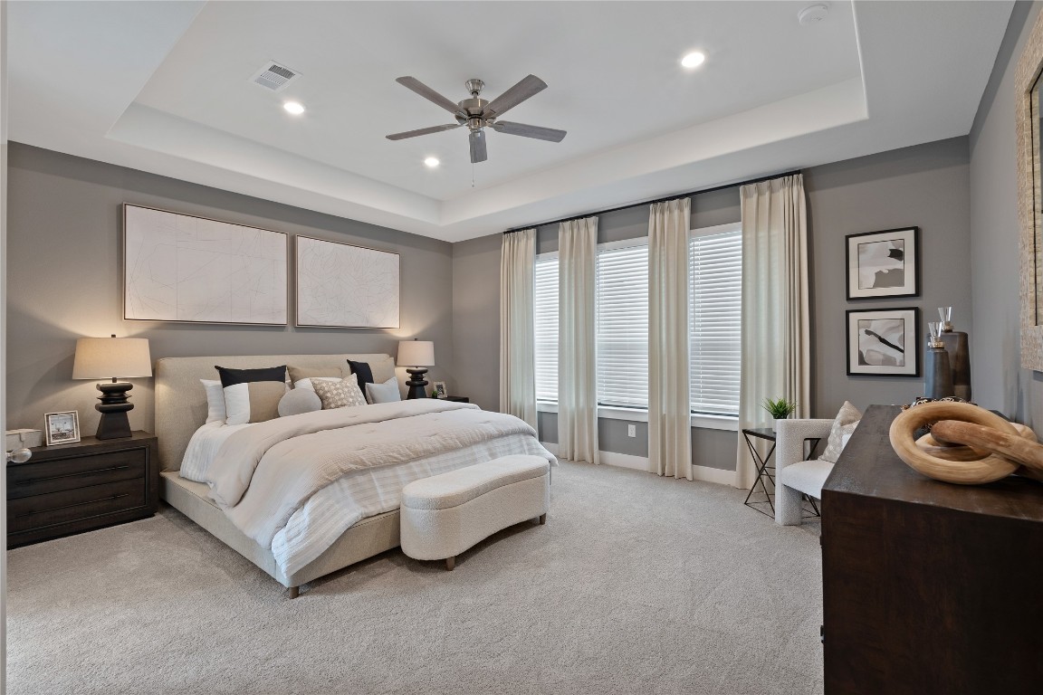 813 Green Ash Way Waller, TX 77484 - Photo 15 of 41 a spacious bedroom with a bed and a large window