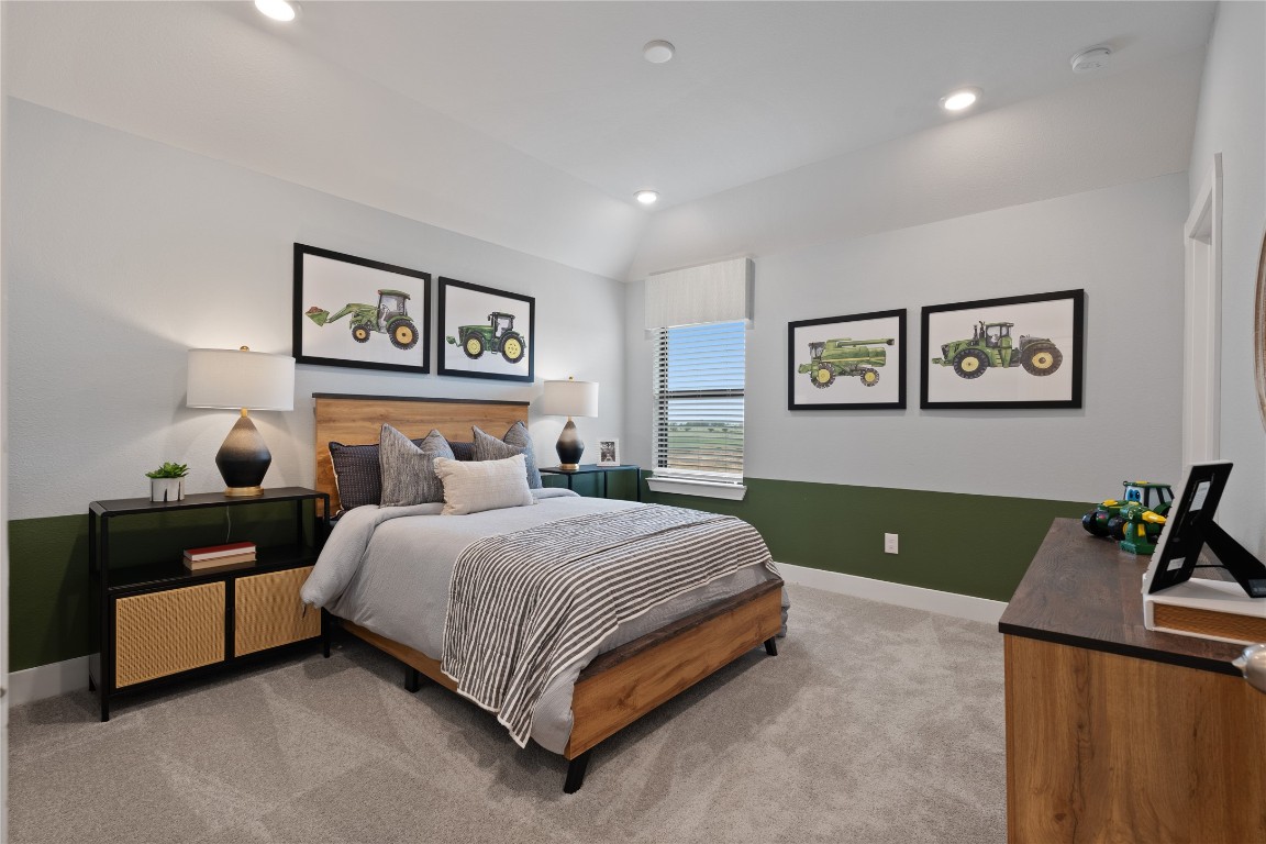 813 Green Ash Way Waller, TX 77484 - Photo 34 of 41 a bedroom with a bed and a view of living room