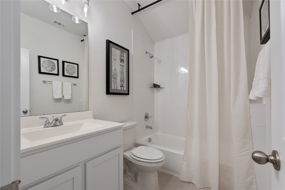 813 Green Ash Way Waller, TX 77484 - Photo 38 of 41 a bathroom with a sink a toilet and shower
