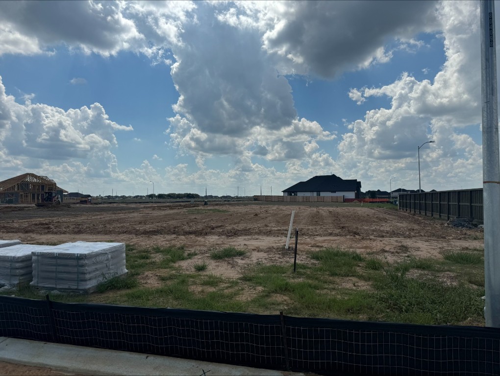 813 Green Ash Way Waller, TX 77484 - Photo 40 of 41 a view of a lake from a yard