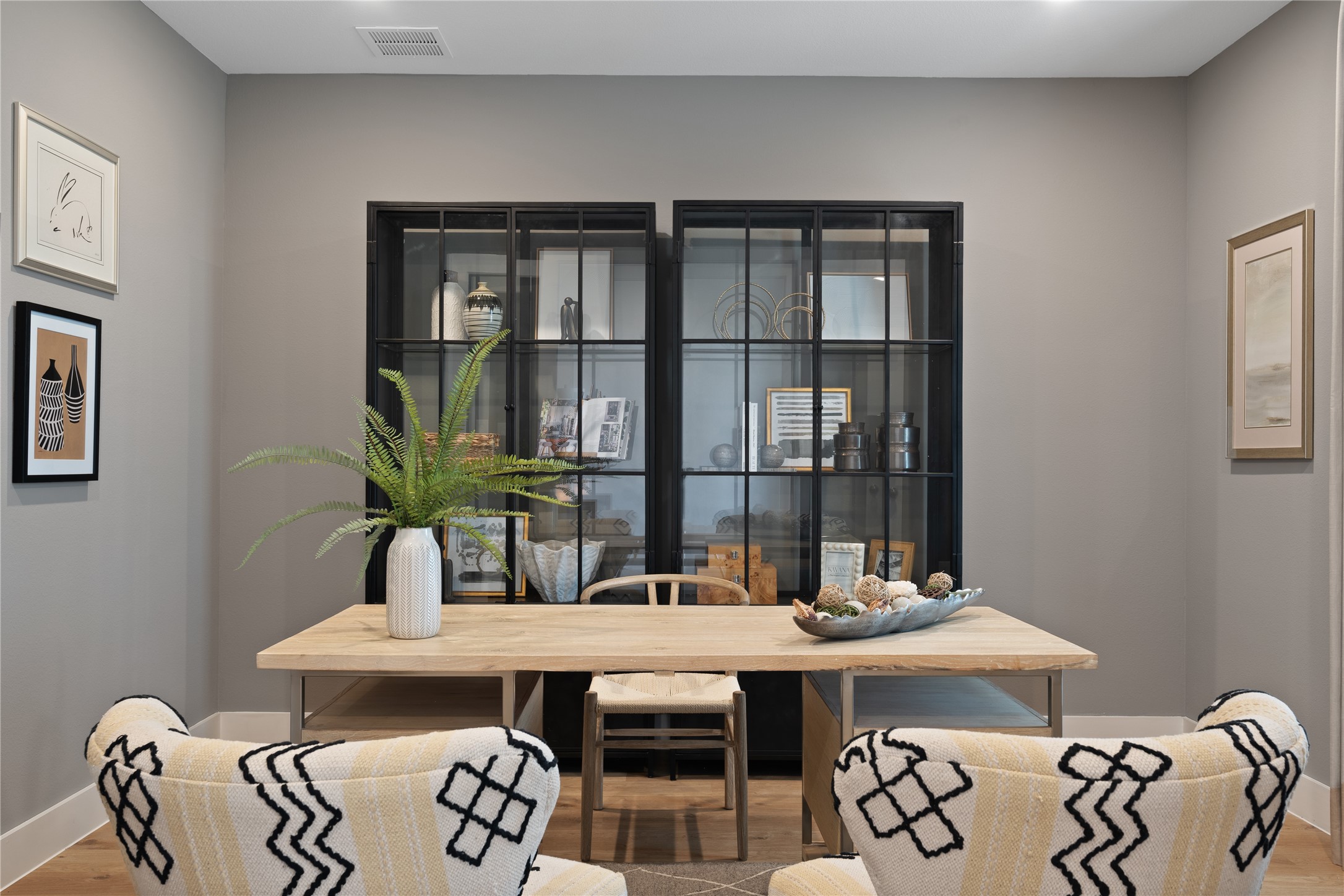 813 Green Ash Way Hempstead, TX 77445 - Photo 5 of 41 a dining room with furniture a rug and a potted plant