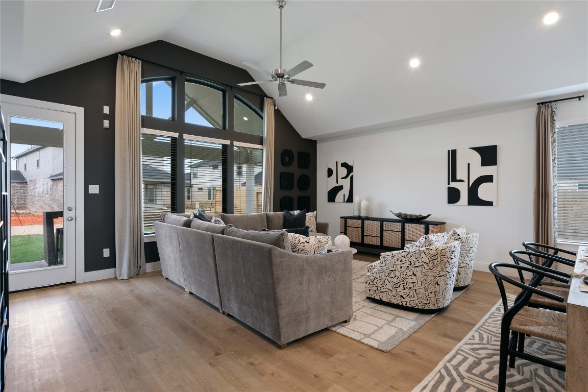 813 Green Ash Way Waller, TX 77484 - Photo 7 of 41 a living room with furniture and a chandelier