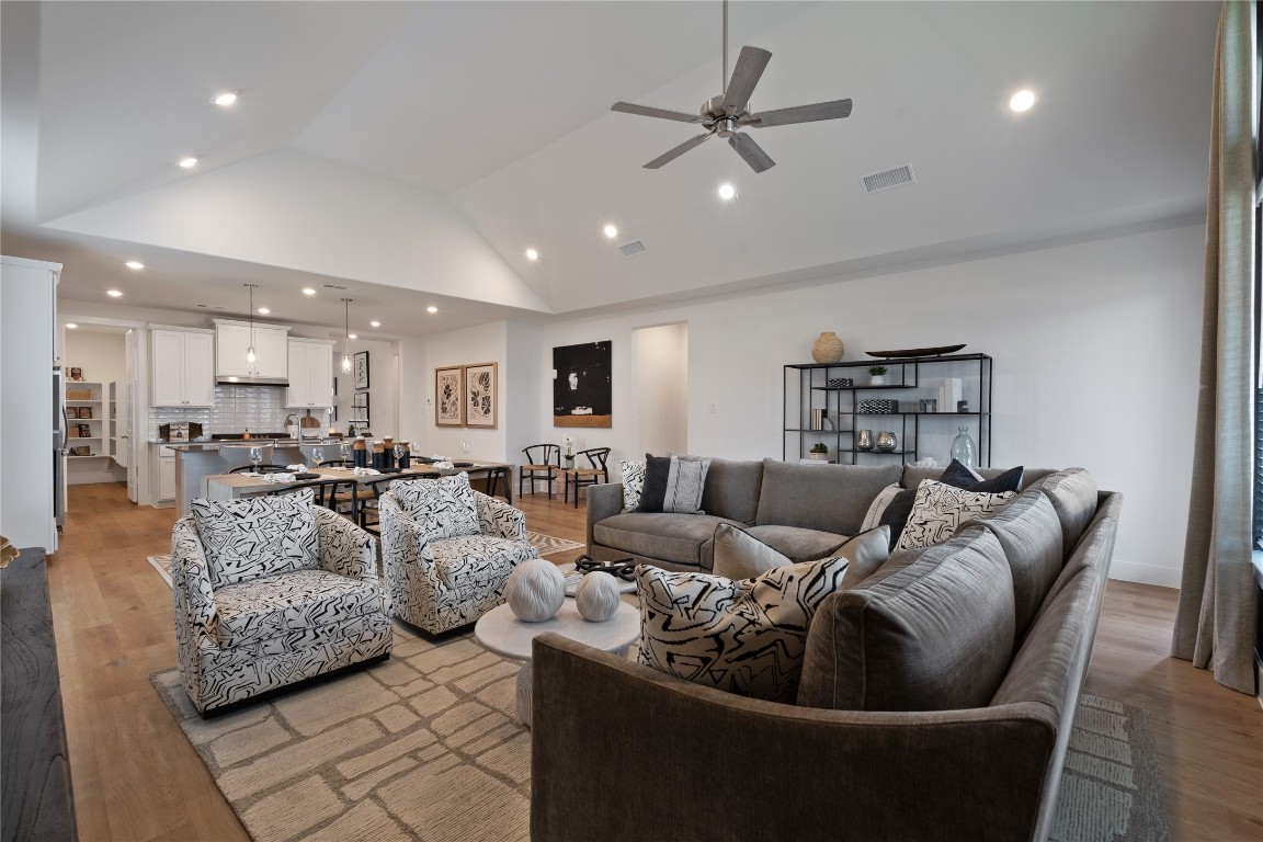 813 Green Ash Way Waller, TX 77484 - Photo 9 of 41 a living room with furniture kitchen view and a chandelier