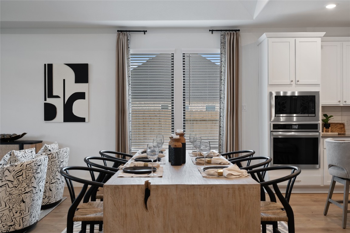 813 Green Ash Way Waller, TX 77484 - Photo 10 of 41 a view of a dining room with furniture