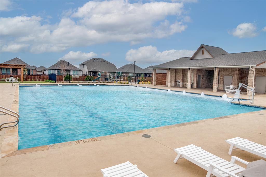 1240 Morning Ridge Trail Aubrey, TX 76227 - Photo 24 of 25 Community pool with a residential view and a patio