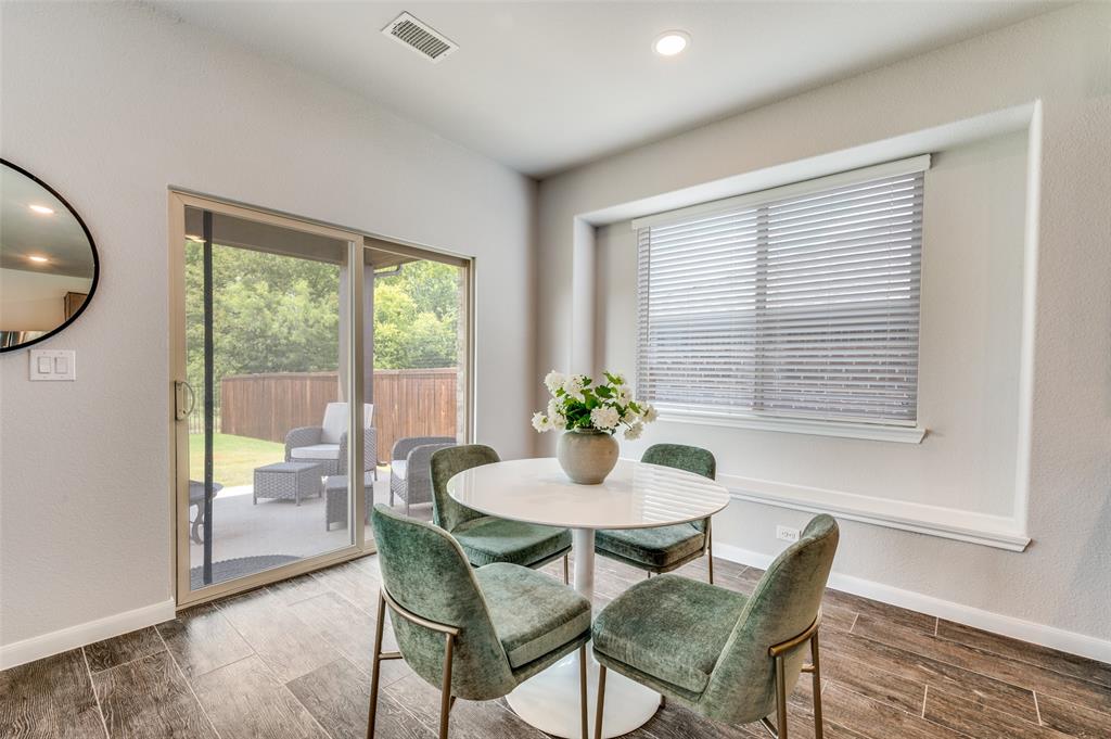 1240 Morning Ridge Trail Aubrey, TX 76227 - Photo 10 of 25 Dining room featuring healthy amount of natural light, wood finished floors, and recessed lighting