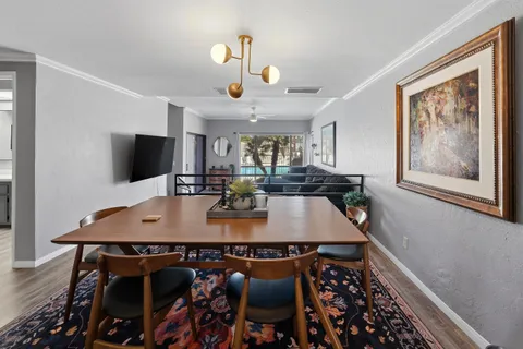 a view of a dining room with furniture