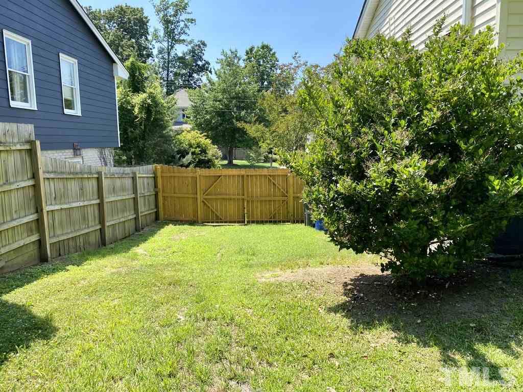 1504 North King Charles Road Raleigh, NC 27610 - Photo 14 of 28 Has a Double Door Entry Area that can fit a full size SUV. The backyard is really big in comparison to other lot within this area of Raleigh