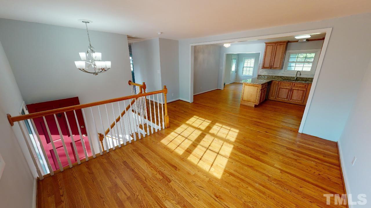 1504 North King Charles Road Raleigh, NC 27610 - Photo 5 of 28 Real Sand and Stain Hardwood not pre-finished or vinyl plank on the upper level.