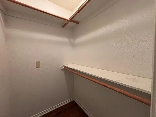 a view of small space with racks on the wall