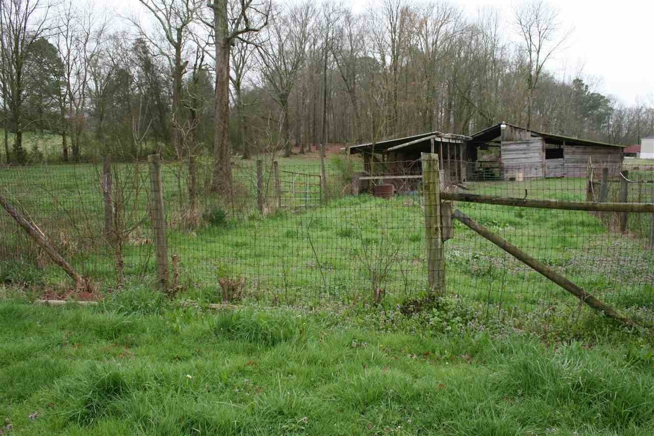 1502 Ladd Springs Road Southeast Cleveland, TN 37323 - Photo 7 of 19 a view of a house with a backyard