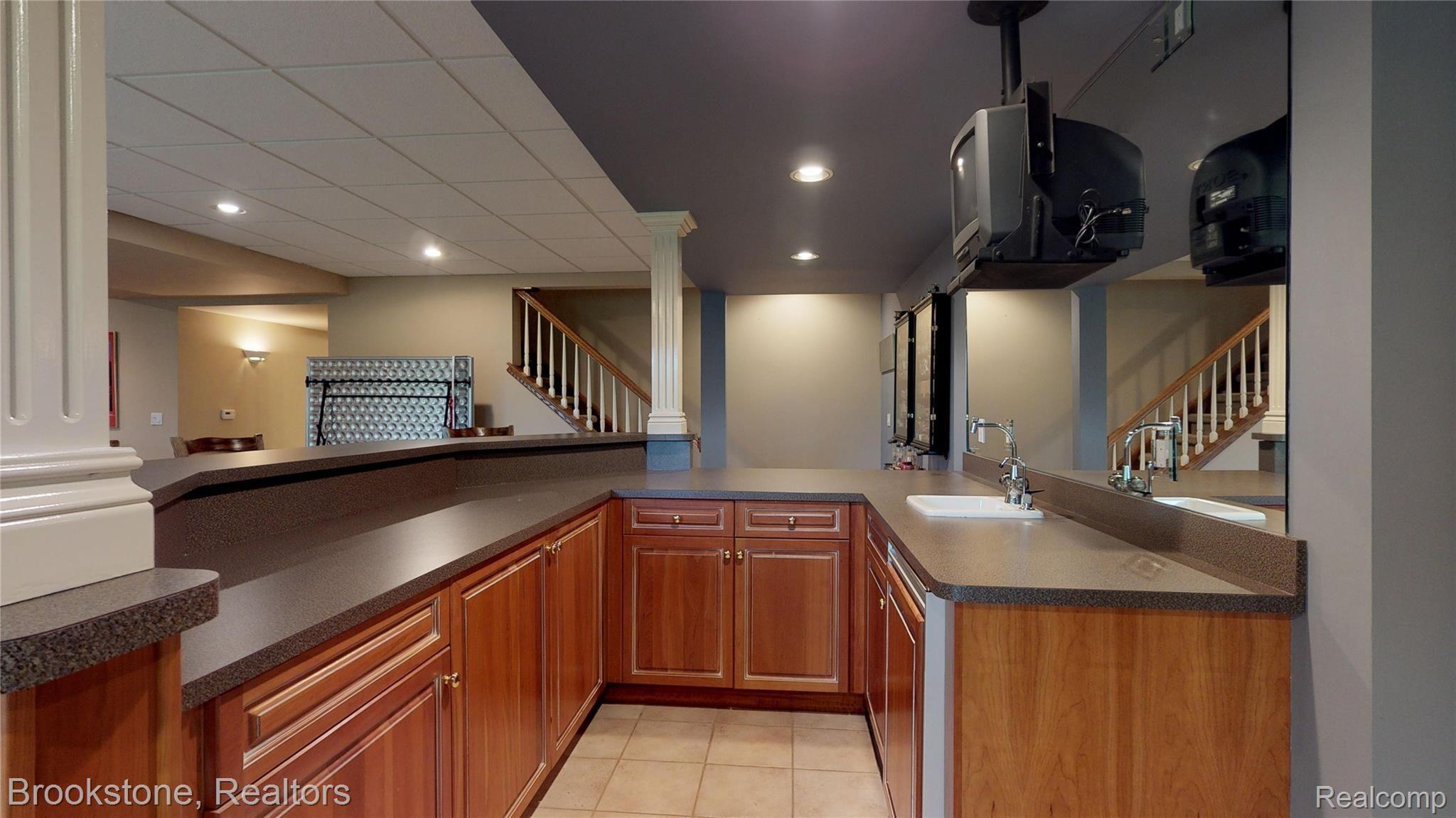 5625 Fox Ridge Drive Clarkston, MI 48348 - Photo 40 of 44 5625-Fox-Ridge-Lower-Bar-3.jpg