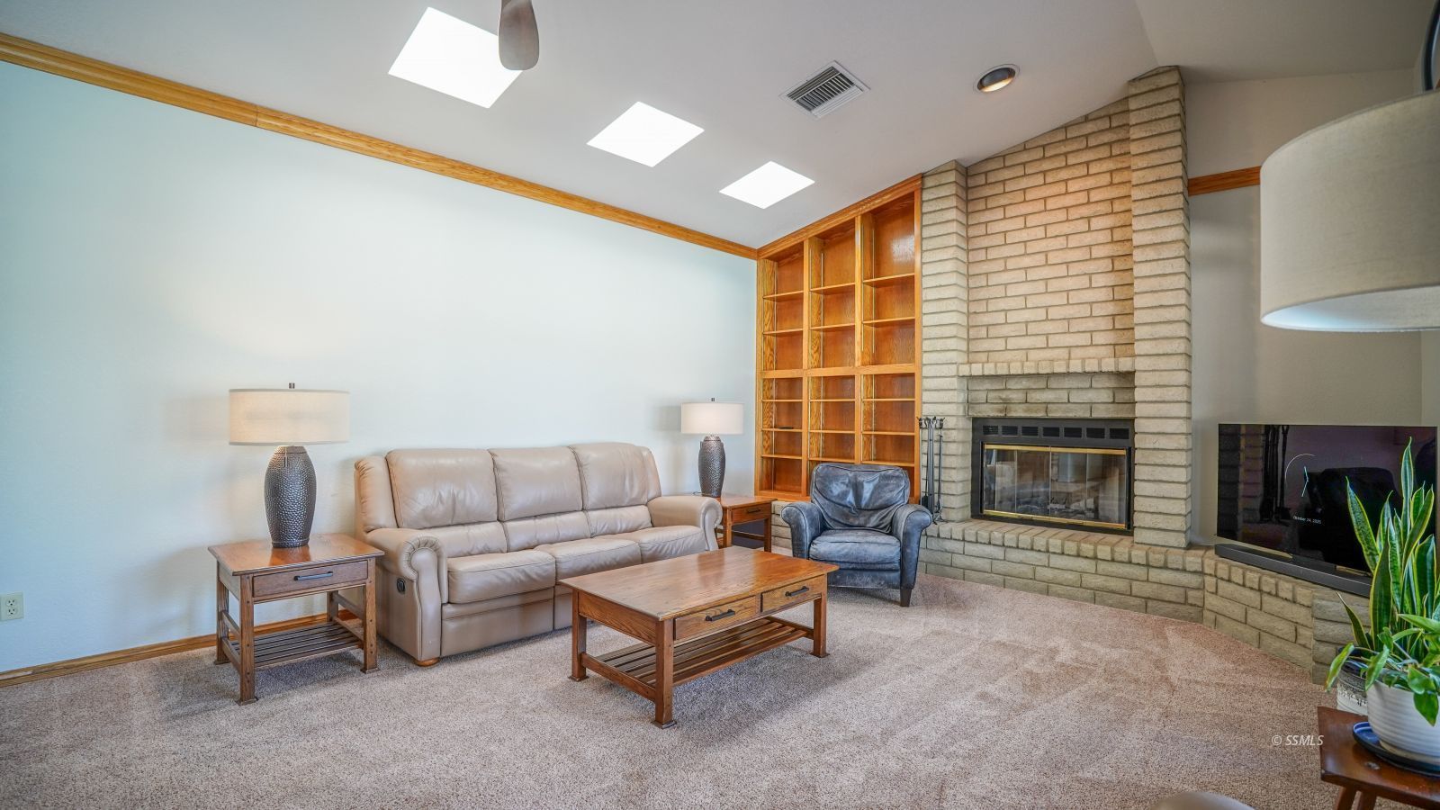 948 Hermosa Avenue Ridgecrest, CA 93555 - Photo 18 of 46 a living room with furniture and a fireplace
