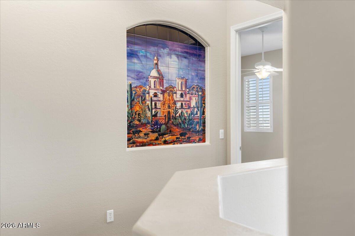 892 West Deep Gorge Road Camp Verde, AZ 86322 - Photo 16 of 38 a view of a hallway with paintings on the wall