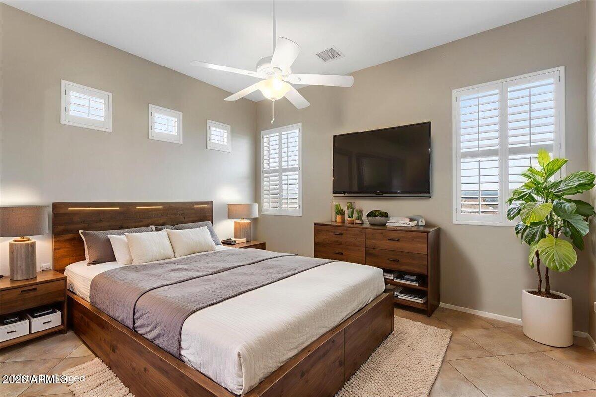892 West Deep Gorge Road Camp Verde, AZ 86322 - Photo 18 of 38 a bedroom with a bed and a flat screen tv